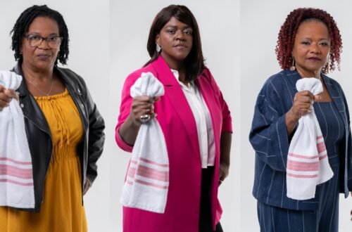 Três mulheres seguram panos brancos em imagem da campanha contra a violência contra trabalhadoras domésticas.